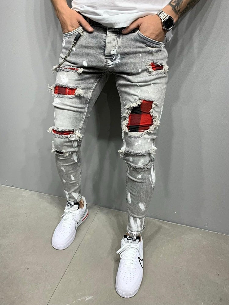 Jeans elasticados rasgados hombre