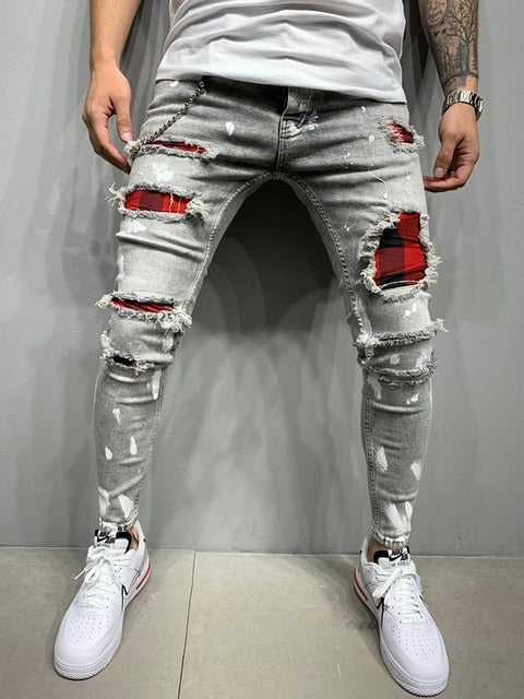 Jeans elasticados rasgados hombre