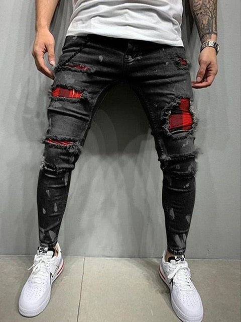 Jeans elasticados rasgados hombre