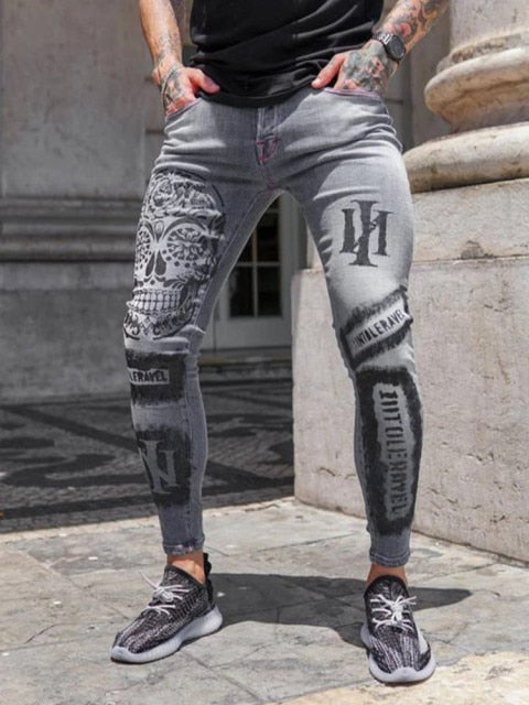 Jeans elasticados rasgados hombre